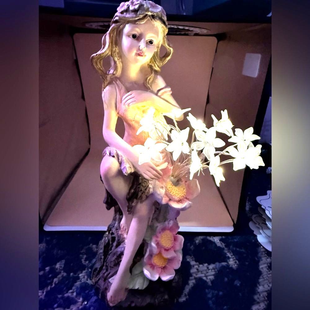 Beautiful girl with led glowing flowers